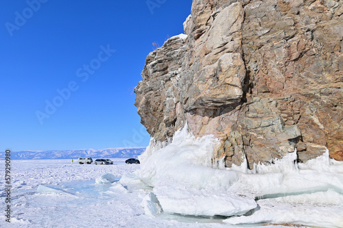 Winter Lake Baikal with Rock Cliffs Covered with ice © panithi33