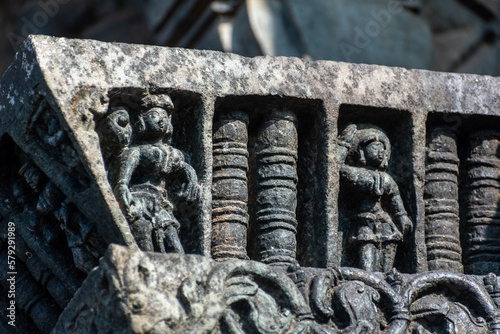 Beautiful stone carvings on the wall of the ancient Channakeshava temple in the town of Belur in Karnataka. photo