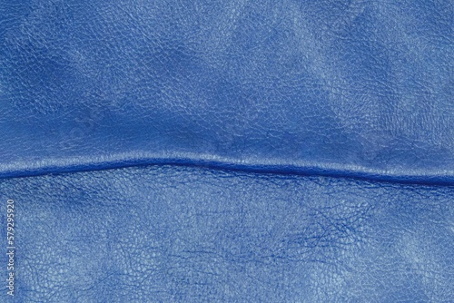 Blue leather cut as background textured and wallpaper. Rustic style