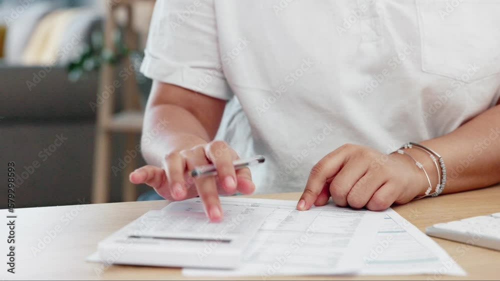 Hands, calculator and accountant calculating and working in an office capture financial data on a computer at workplace. Closeup, tax and calculation by business person with profit for accounting