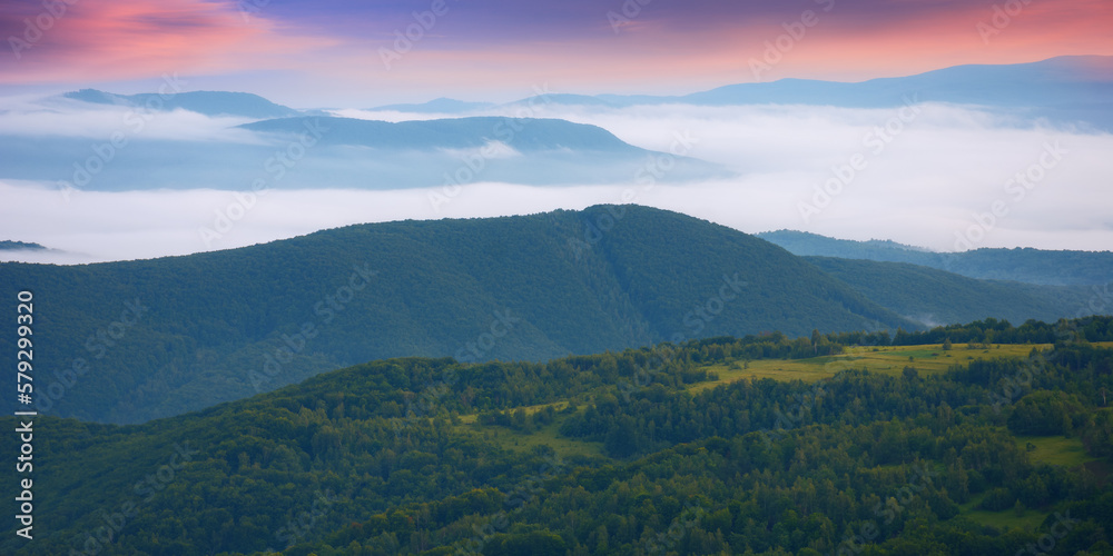 summer mountains on a cloudy sunrise. travel background