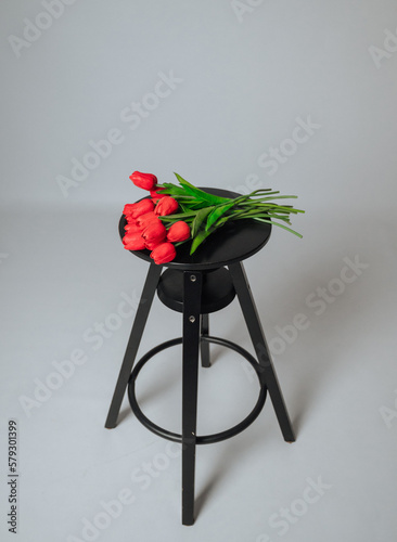 a bouquet of red tulips on a white background