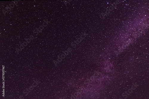 Milky Way galaxy in dark purple night sky