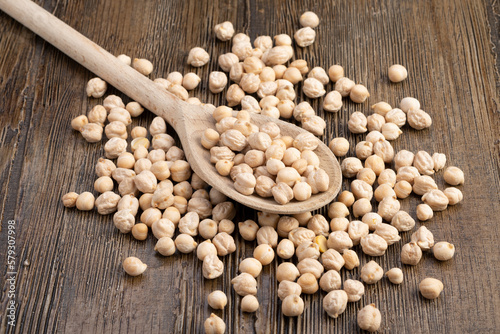 chickpeas in a wooden spoon