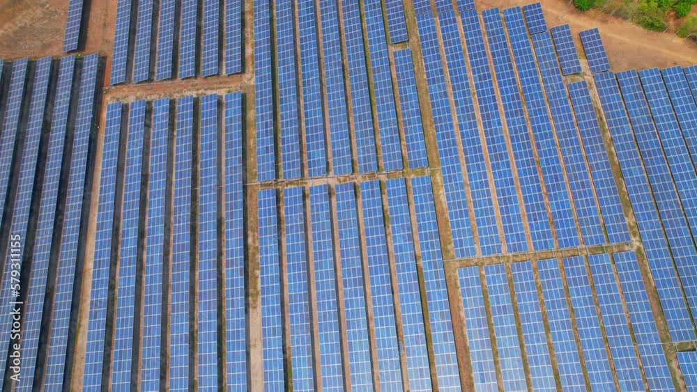 Aerial view above solar panels during daylight. Solar panels do not