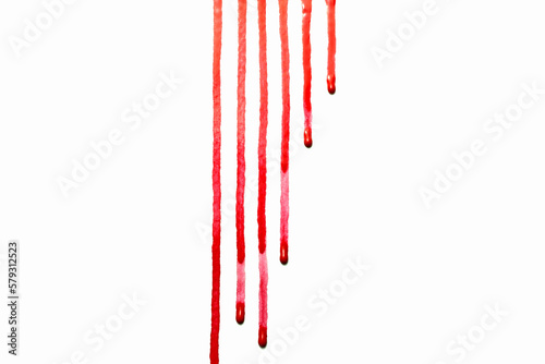 Red water color drips down on white background,Or as drop of blood,Abstract color	