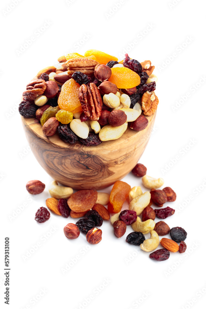 Mix of nuts and dried fruits isolated on a white background. Mix of nuts and dried fruits isolated on a white background.
