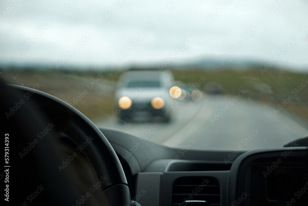 Driving a car - perspective of a driver - bokeh effect