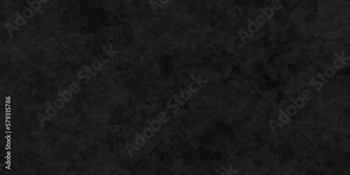 Dark black on dark texture chalkboard and blackboard backdrop background. Black or dark gray rough grainy concrete wall stone texture background. Textured of stone grunge on black grunge background.