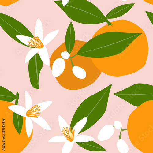 Blossoming of oranges. Citrus tropical fruits on a pink background with green leaves create a cute seamless pattern for printing on fabrics. 