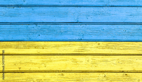 Wallpaper Mural Wood painted in Ukrainian Flag. Bright colors paint on wooden wall. Flag of Ukraine. Blue and yellow country symbol colors. Simple banner background. Torontodigital.ca