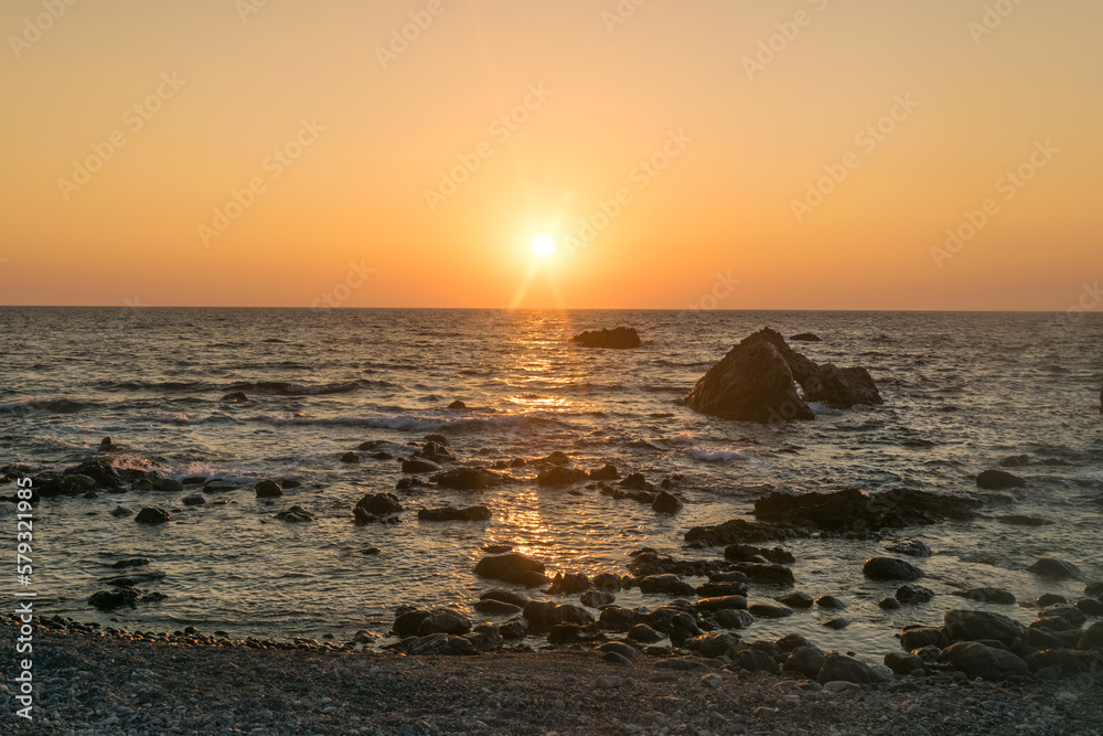 Sunset over Sfinari Beach in Crete, Greece