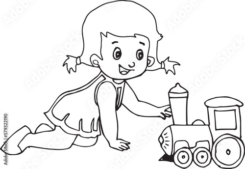 girl playing with toy train