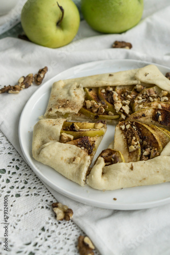 Rustick french apple tarte galette homemade fresh baked close up selcetive focus photo