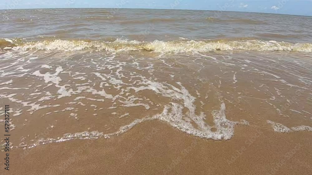 Slow motion of Rolling ocean waves captured from an aerial camera angle. Daytime weather during the summer season. Slow motion of Rolling ocean waves captured from an aerial camera angle. Daytime weather during the summer season.