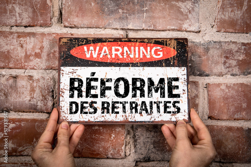 Fotografia PENSION REFORM in French. Warning sign with text