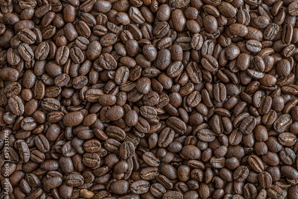 coffee background of roasted coffee beans close up coffee background of roasted coffee beans close up