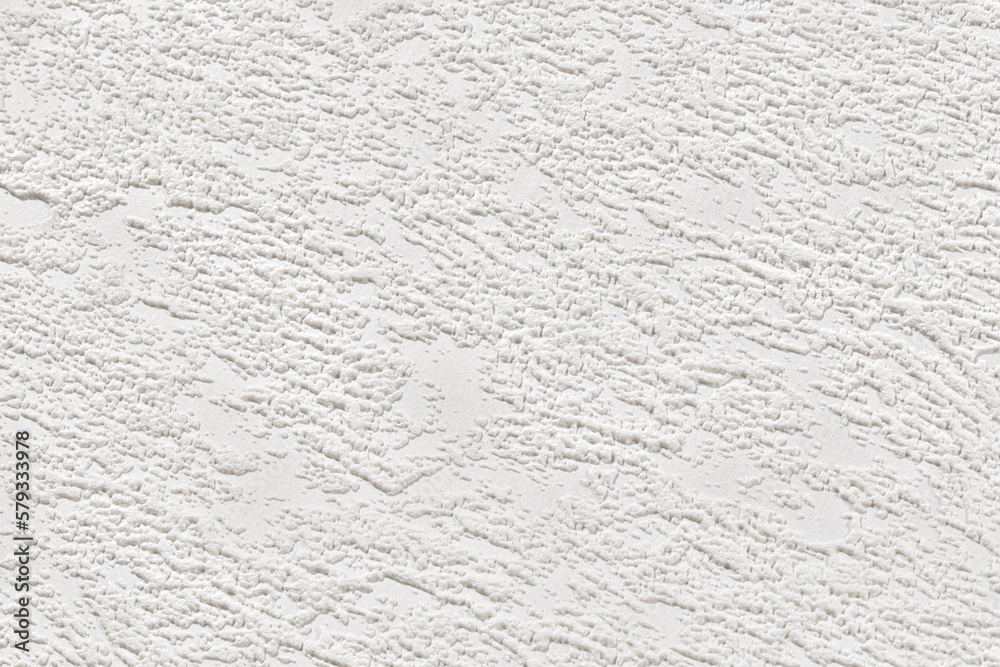 White texture of paper wallpaper with abstract stains. Plastered embossed wall. White texture of paper wallpaper with abstract stains. Plastered embossed wall.
