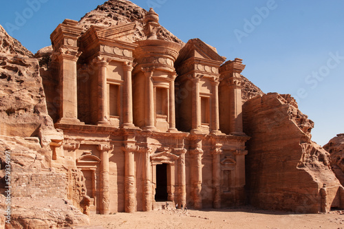 Jordan, Petra. Facade of Ad-Deira resembles Treasury in simplified version. Facade of Ad-Deir Monastery. Monastery, carved into sandy rocks, is one of most famous sights of Petra. Close-up.