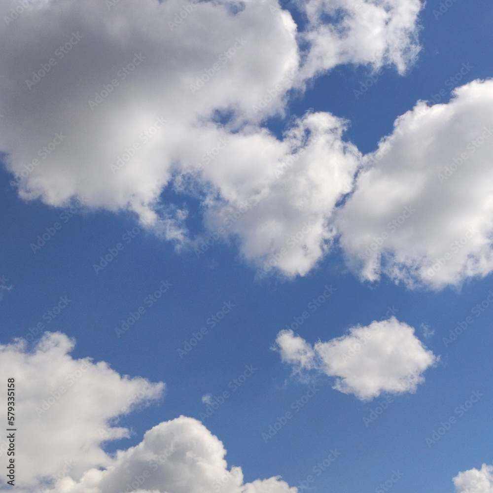 Obraz premium White clouds isolated over blue sky background