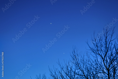 Venus and Jupiter conjunction over the blue sky, Poland