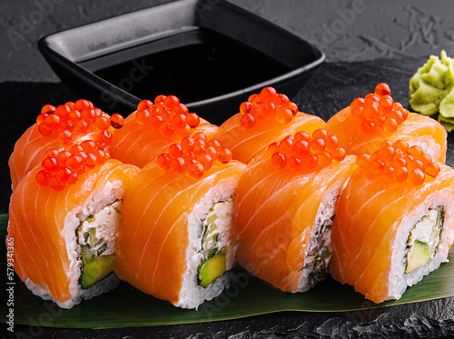 Philadelphia roll sushi with salmon on a dark background