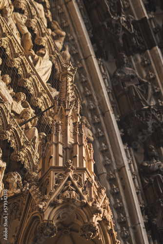 Vertical shot of the facade of the Cologne Cathedral with decoration and ornaments, Cologne, Germany