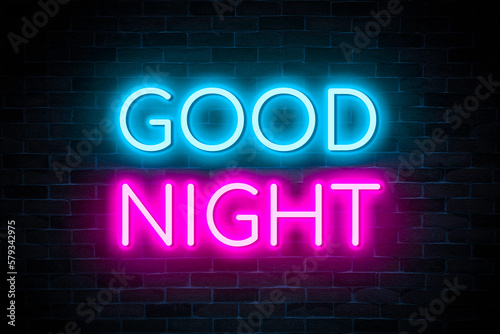 Good Night neon banner on brick wall background.