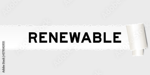 Ripped gray paper background that have word renewable under torn part