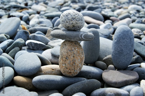 A tower of pebbles on a stony beach. Zen stones.