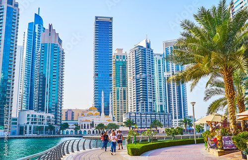 Enjoy the walk along Dubai Marina, UAE photo