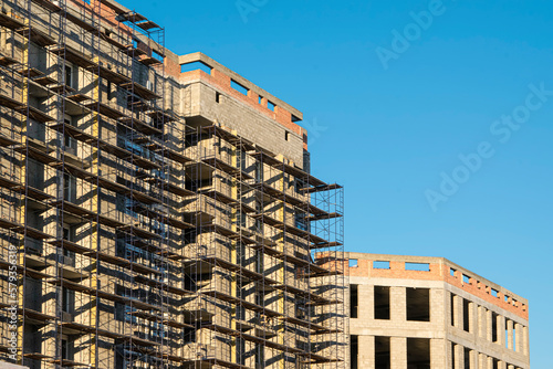 Construction of a multi-storey residential building, scaffolding