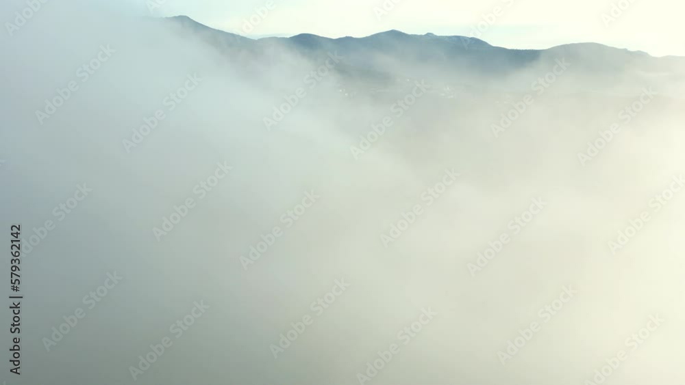 4K Drone shot of Corsica Island in the Mediterranean sea, scenic mountain view of flying above the clouds 4K Drone shot of Corsica Island in the Mediterranean sea, scenic mountain view of flying above the clouds
