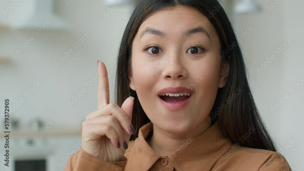 Portrait thoughtful dreaming Asian korean woman girl in kitchen think thought pondering search solution excited chinese businesswoman come up with idea eureka good plan raise finger insight brainstorm