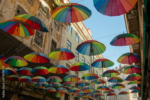 Colorful rainbow umbrellas on Pink Street in Lisbon  Portugal  Europe