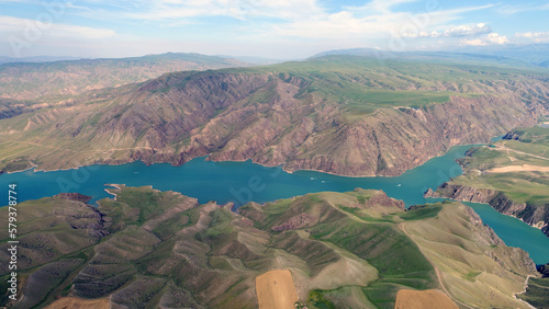 Tex kush tower according to the reservoir in xinjiang: embedded in alpine grassland of emeralds photo