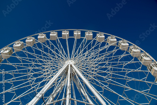Ferris Wheel over blue sky, Lisbon, Portugal