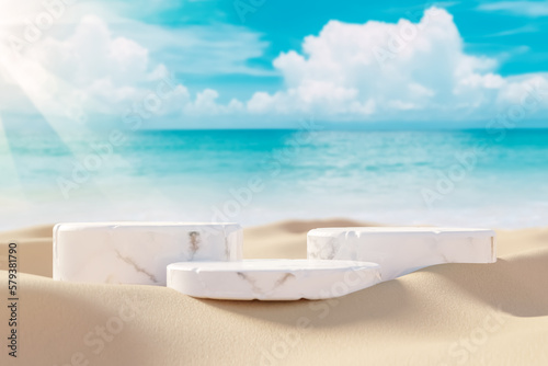 3D podium with copy space for product display presentation on beach with blue sky and white clouds abstract background. Tropical summer and vacation concept.