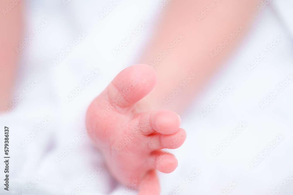 Portrait of a newborn Asian baby girl sleep on the bed , cute Fat baby 5 day. Portrait of a newborn Asian baby girl sleep on the bed , cute Fat baby 5 day.