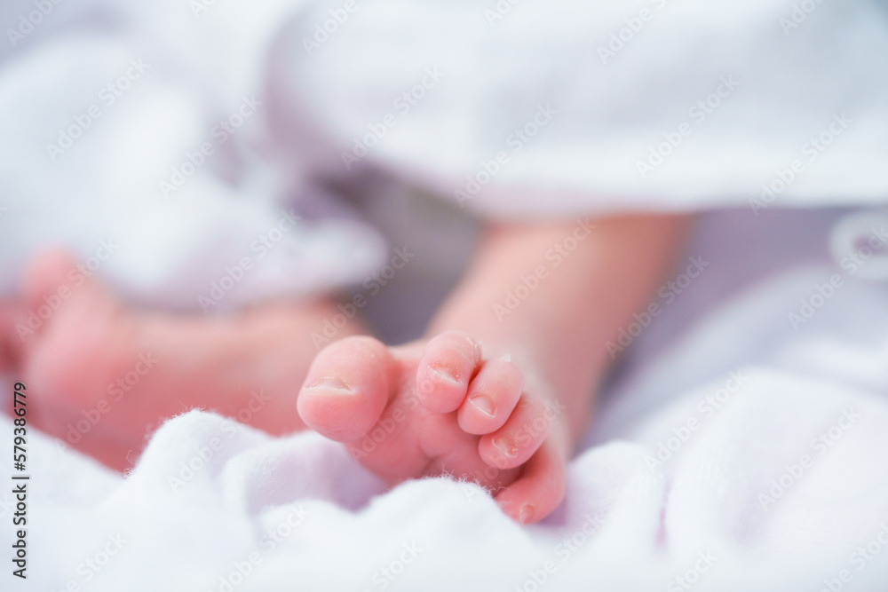 Portrait of a newborn Asian baby girl sleep on the bed , cute Fat baby 5 day. Portrait of a newborn Asian baby girl sleep on the bed , cute Fat baby 5 day.