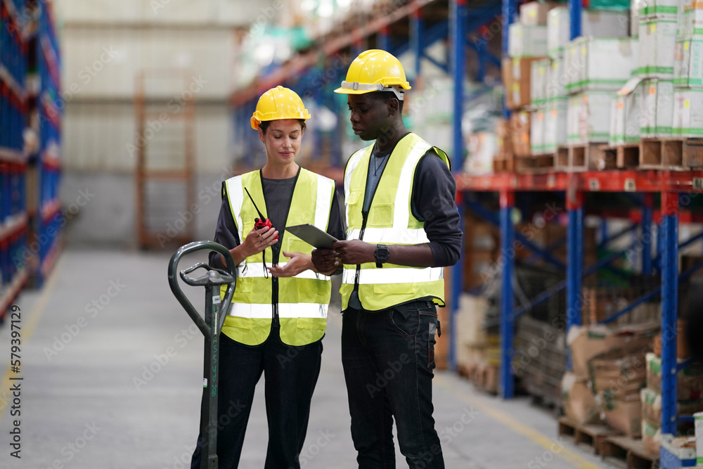 Worker Doing Inventory in Warehouse. Dispatcher in uniform making inventory in storehouse. supply chain concept Worker Doing Inventory in Warehouse. Dispatcher in uniform making inventory in storehouse. supply chain concept