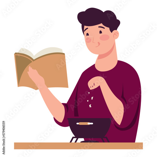 man cooking reading recipe