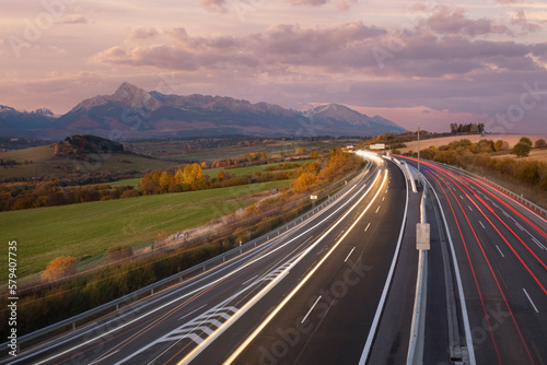 evening highway with light paths under Krivan hill, High Tatras,Slovakia