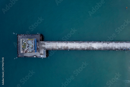 Drone shot of a metallic pier of the sea, cool for background © Ben White/Wirestock Creators