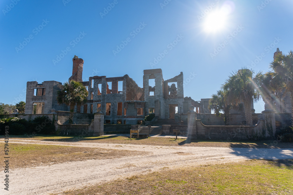 Cumberland Island National Seashore. Cumberland Island, largest of Georgia's Golden Isles, is managed by National Park Service. Dungeness Mansion ruins once owned by Carnegie Family, ruined by fire.
