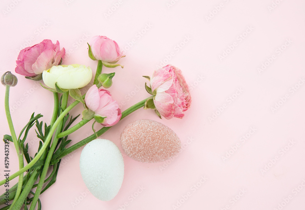 Easter eggs and Buttercups flower bouquet on pastel pink background, copy space. Easter eggs and Buttercups flower bouquet on pastel pink background, copy space.