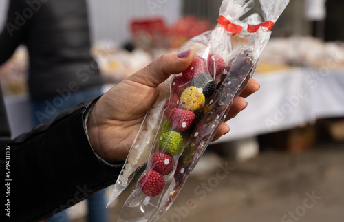 Traditional Polish candies from a stand with regional sweets in Kraków, such as miodek turecki, trupi miodek or pańska skórka. Treats sold during All Saints' Day and Easter Emaus in Krakow, Poland.