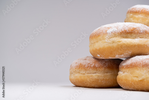 Fotografia Polish pączki deep-fried doughnuts with copy space