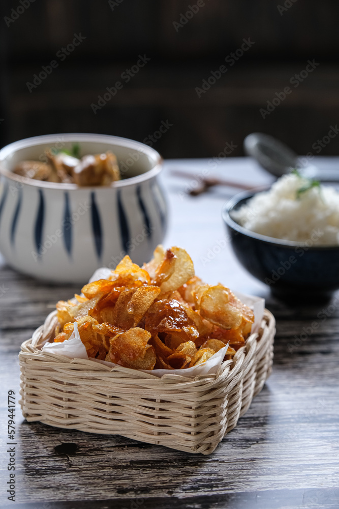 Fried potato slice with chili, keripik kentang balado