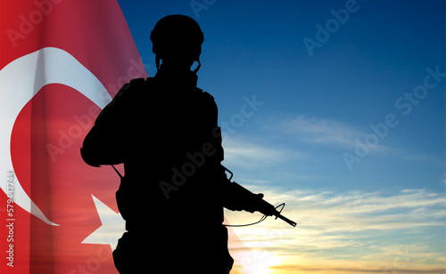 Silhouette of soldier with Turkey flag on background of sky. Background for Turkish Armed Forces Day, Victory Day. EPS10 vector